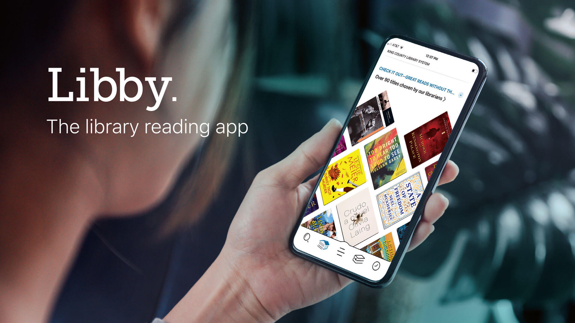 Graphic promoting the Libby app, with person holding a smartphone with the app open.
